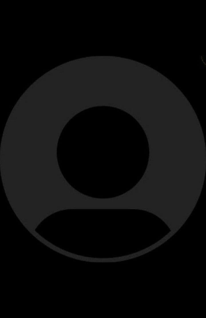 Dark gray circular profile placeholder with a black silhouette of a person's head and shoulders.